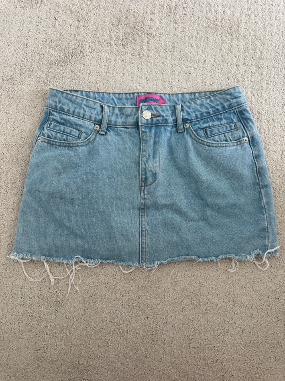 Edikted Light Blue Denim Mini Skirt with Frayed Hem